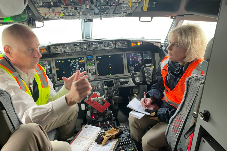 NTSB Chair Jennifer Homendy takes notes during a conversation aboard the Boeing 737 Max 9 involved in Alaska Airlines 1282 on Jan. 5, 2024.